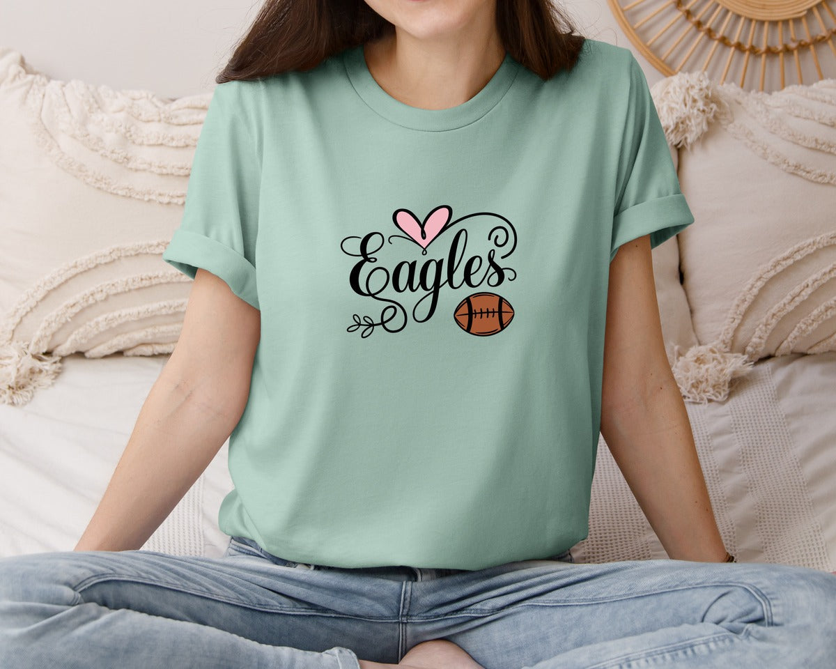 brand:Bella Canvas|color:Dusty Blue|Eagles Football Mascot Pink Heart Graphic T-Shirt