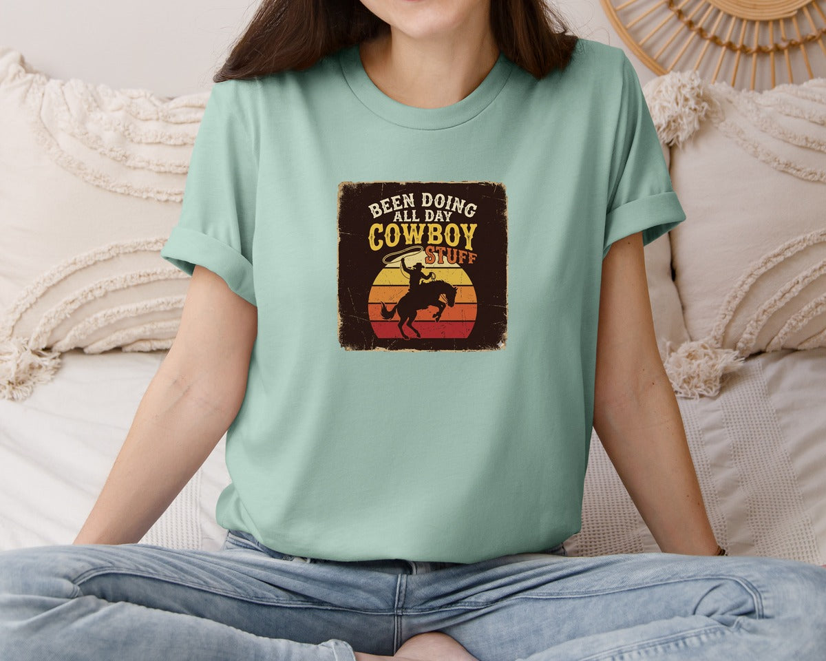 brand:Bella Canvas|color:Dusty Blue|Cowboy Stuff Retro Rodeo Sunset Graphic T-Shirt