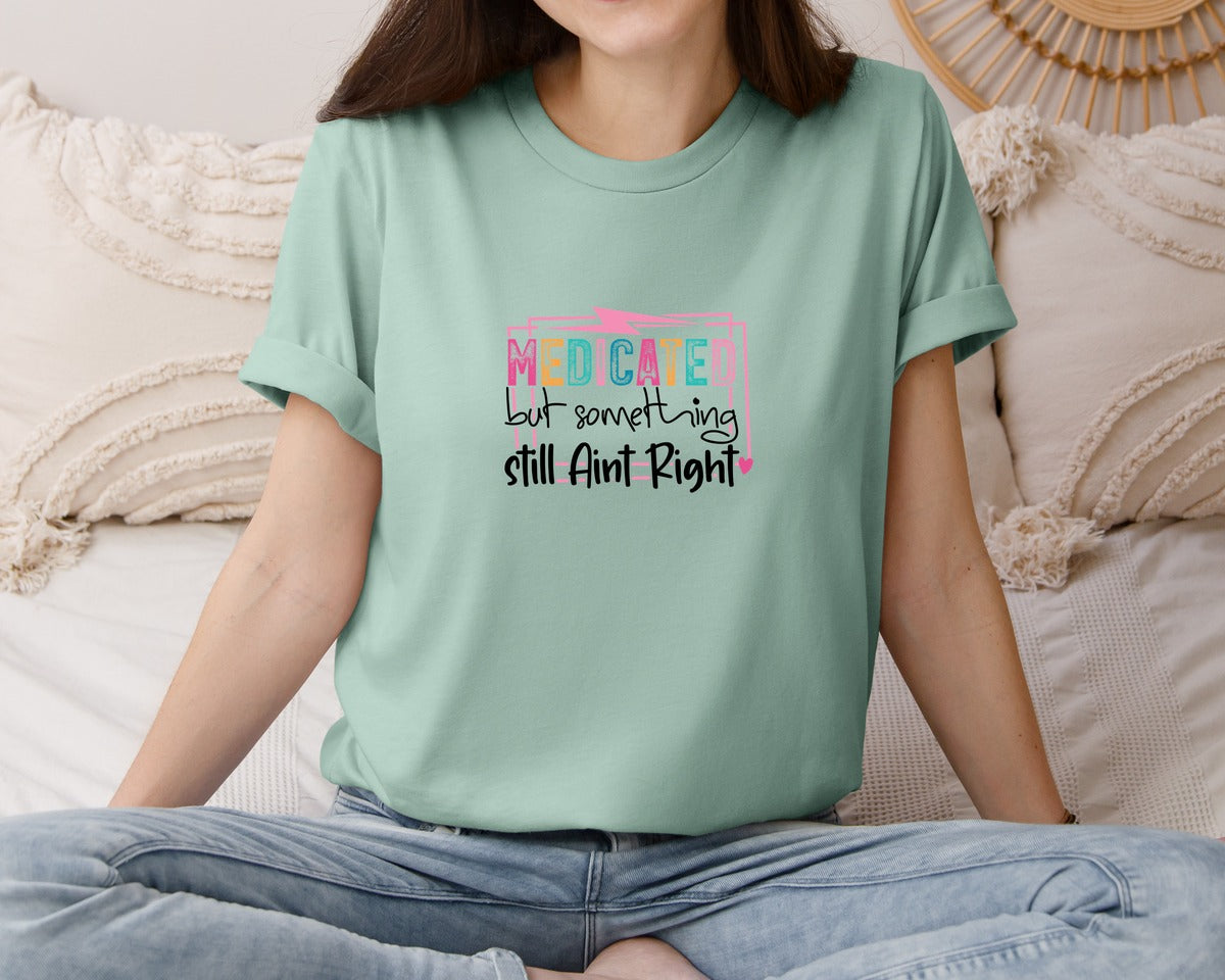 brand:Bella Canvas|color:Dusty Blue|Medicated But Somethin Aint Right Snarky Graphic T-Shirt