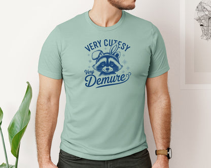 brand:Bella Canvas|color:Dusty Blue|Very Cutesy Very Demure Raccoon T Shirt Graphic T-Shirt