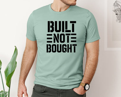 brand:Bella Canvas|color:Dusty Blue|Built Not Bought Typography T Shirt Desi Graphic T-Shirt