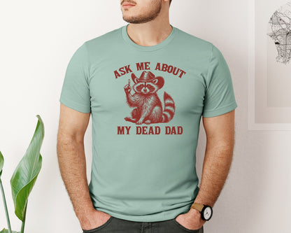 brand:Bella Canvas|color:Dusty Blue|Dead Dad Club Unhinged Meme Raccoon Graphic T-Shirt