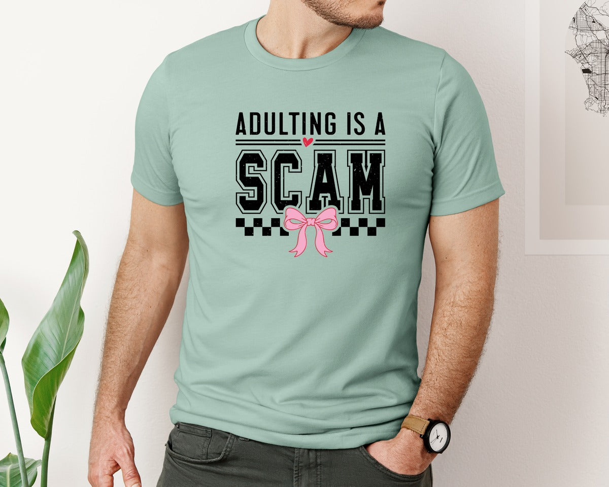 brand:Bella Canvas|color:Dusty Blue|Adulting Is A Scam Sarcastic Graphic T-Shirt
