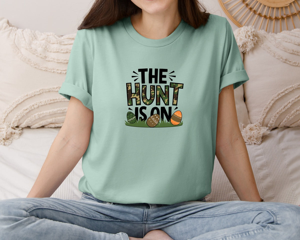 brand:Bella Canvas|color:Dusty Blue|The Hunt Is On Camo Easter Egg Camo Graphic T-Shirt