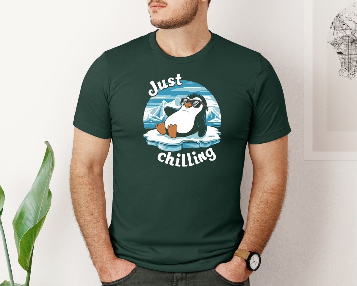 brand:Bella Canvas|color:Forest Green|Just Chilling Penguin Pun Relaxed Vibes Graphic T-Shirt