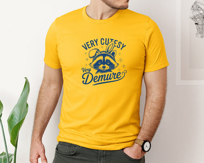 brand:Bella Canvas|color:Gold|Very Cutesy Very Demure Raccoon T Shirt Graphic T-Shirt