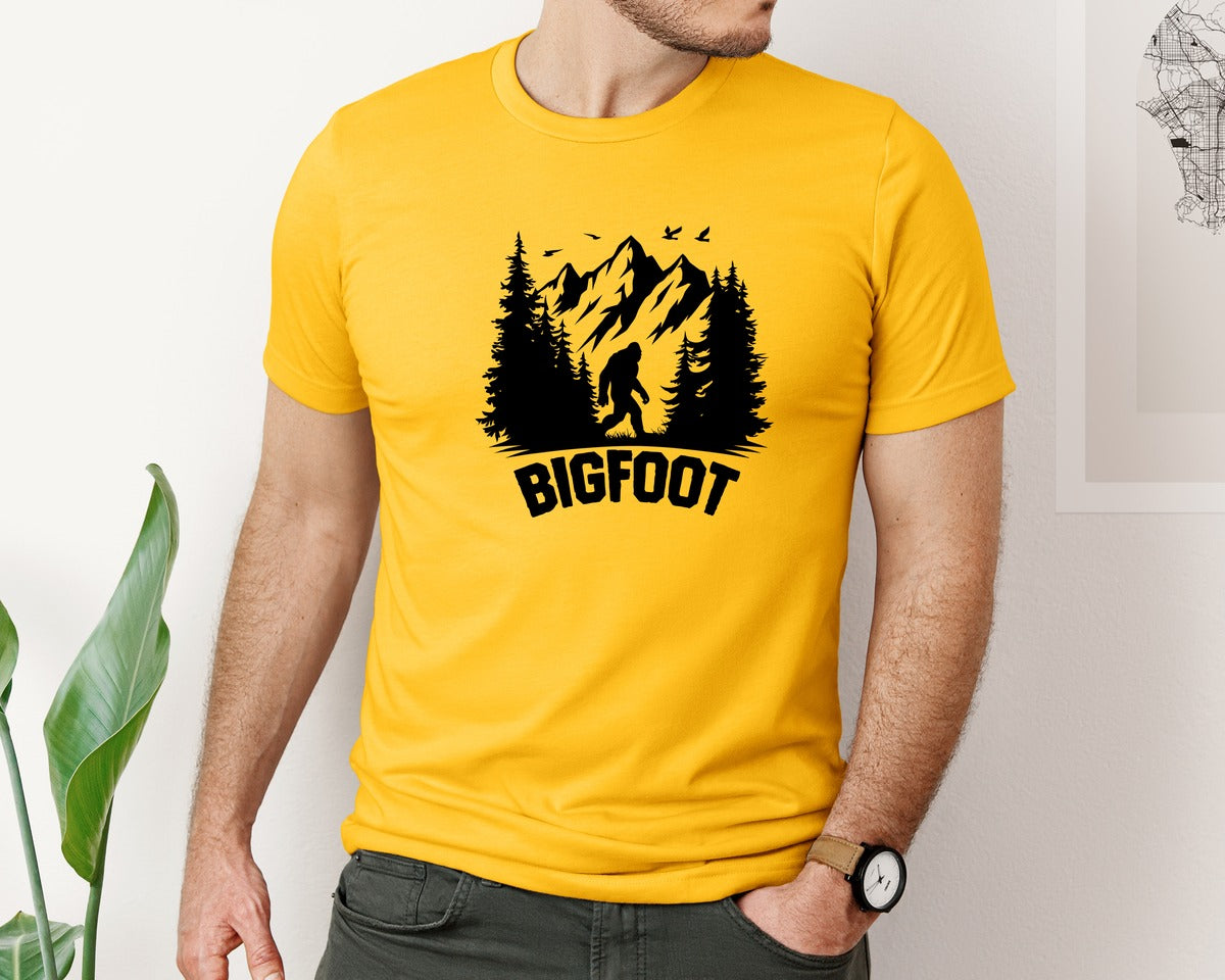 brand:Bella Canvas|color:Gold|Retro Bigfoot Silhouette Pixel Art Graphic T-Shirt