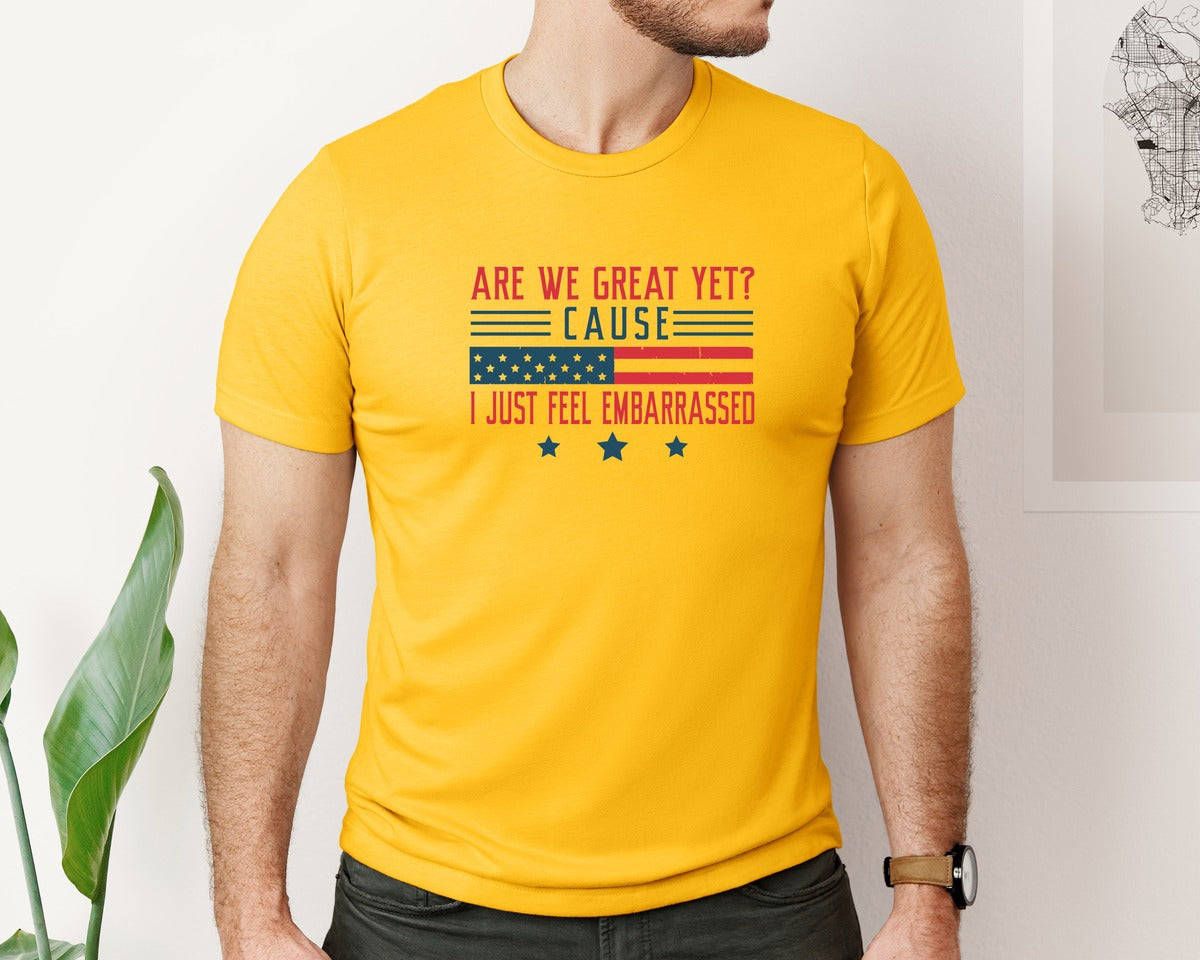brand:Bella Canvas|color:Gold|Are We Great Yet Cause I Just Feel Embar Graphic T-Shirt