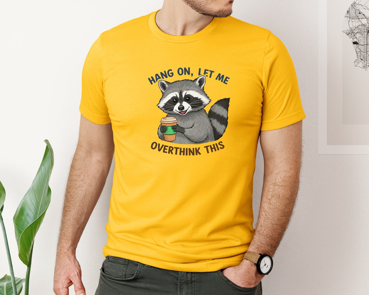 brand:Bella Canvas|color:Gold|Hang On Let Me Overthink This Raccoon 3 Graphic T-Shirt