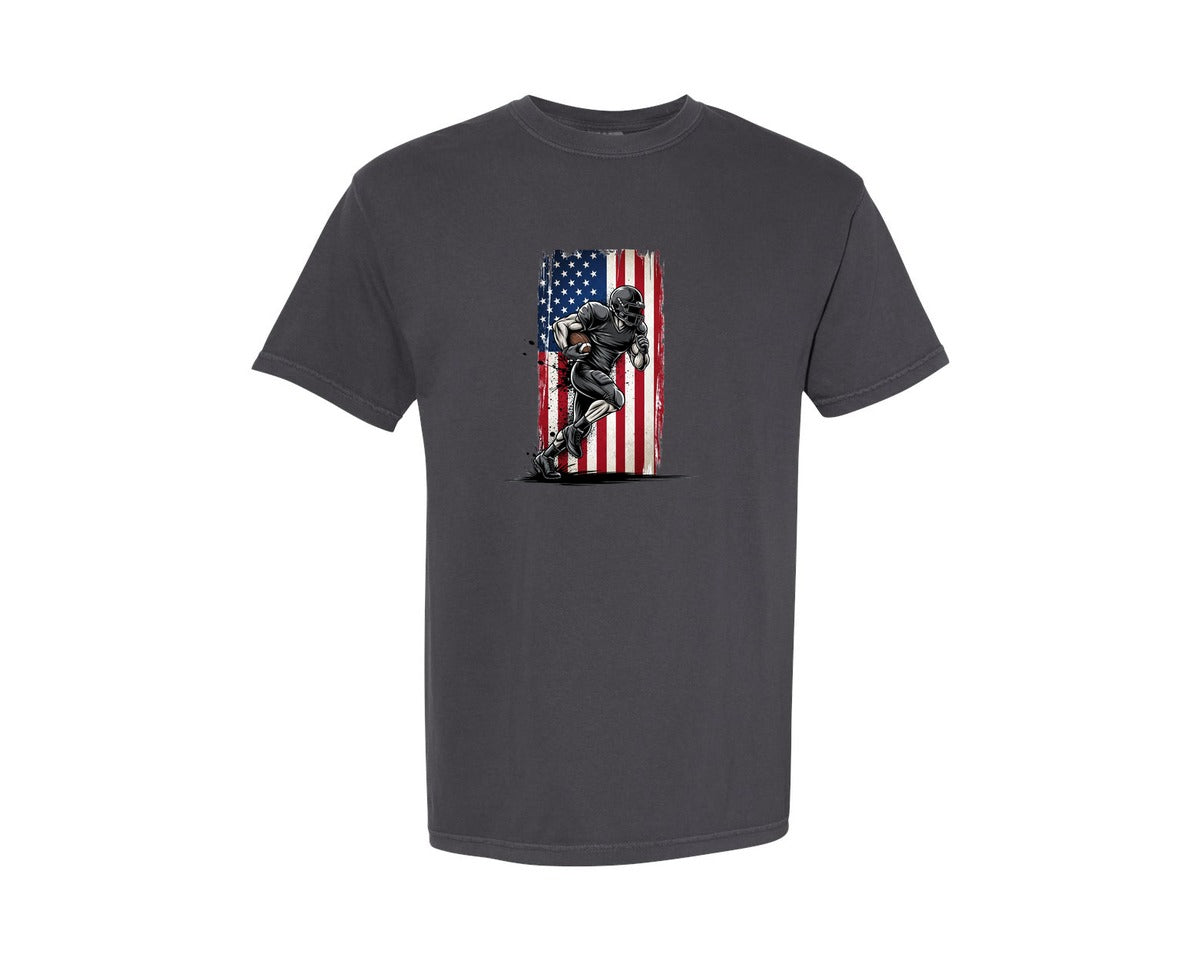 brand:Comfort Colors|color:Graphite|Distressed American Flag Football Player Graphic T-Shirt