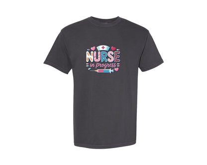 brand:Comfort Colors|color:Graphite|Nurse In Progress Medical Themed Design Graphic T-Shirt