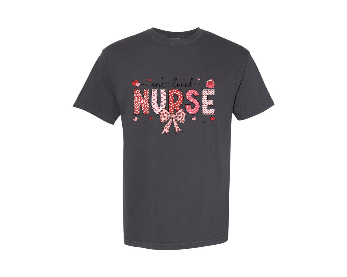 brand:Comfort Colors|color:Graphite|Nurse Valentine Coquette Bow One Loved Graphic T-Shirt