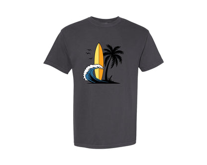 brand:Comfort Colors|color:Graphite|Surfboard With Ocean Wave And Palm Tree Graphic T-Shirt