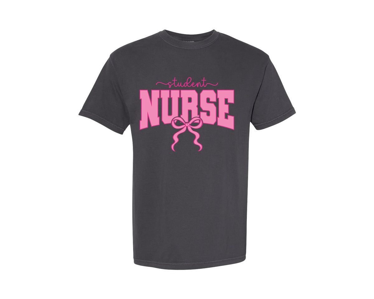brand:Comfort Colors|color:Graphite|Student Nurse Coquette Nurse Pink Bow Graphic T-Shirt