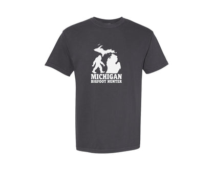 brand:Comfort Colors|color:Graphite|Michigan Bigfoot Hunter Graphic T-Shirt