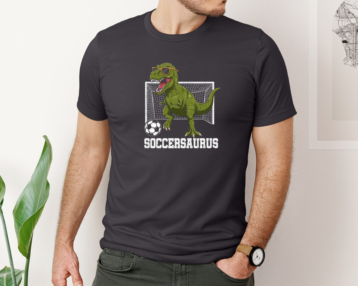 brand:Bella Canvas|color:Heather Dark Grey|T Rex Playing Soccer T Shirt Graphic T-Shirt