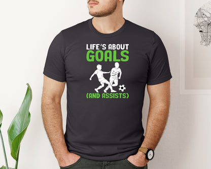 brand:Bella Canvas|color:Heather Dark Grey|Lifes About Goals Soccer T Shirt Graphic T-Shirt