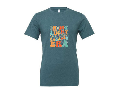 brand:Generic|color:Heather Deep Teal|In My Lucky Engaged Era 2 Graphic T-Shirt