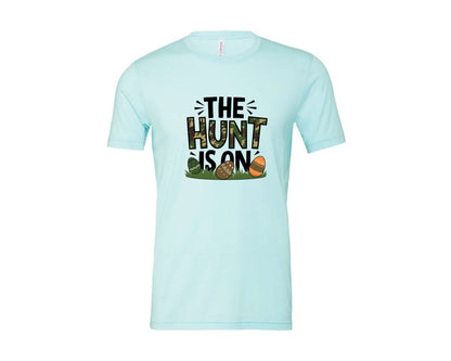 brand:Bella Canvas|color:Heather Ice Blue|The Hunt Is On Camo Easter Egg Camo Graphic T-Shirt