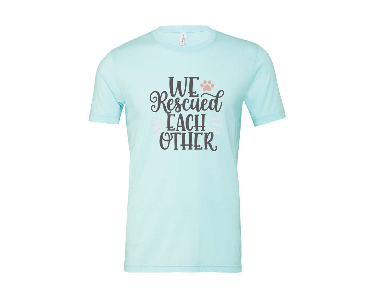 brand:Bella Canvas|color:Heather Ice Blue|We Rescued Each Other Cute Cat Quote Graphic T-Shirt