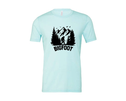 brand:Bella Canvas|color:Heather Ice Blue|Retro Bigfoot Silhouette Pixel Art Graphic T-Shirt