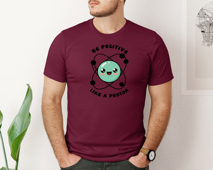 brand:Bella Canvas|color:Heather Maroon|Be Positive Like A Proton Graphic T-Shirt