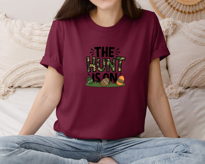 brand:Bella Canvas|color:Heather Maroon|The Hunt Is On Camo Easter Egg Camo Graphic T-Shirt
