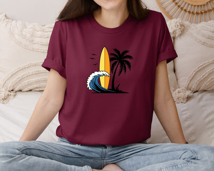 brand:Bella Canvas|color:Heather Maroon|Surfboard With Ocean Wave And Palm Tree Graphic T-Shirt