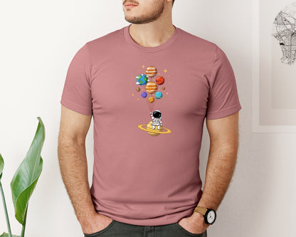 brand:Bella Canvas|color:Heather Mauve|Astronaut With Planet Balloons Graphic T-Shirt