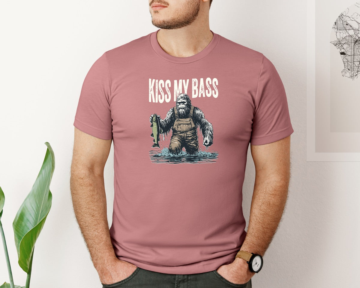 brand:Bella Canvas|color:Heather Mauve|Kiss My Bass Funny Bigfoot Fishing Shirt Graphic T-Shirt