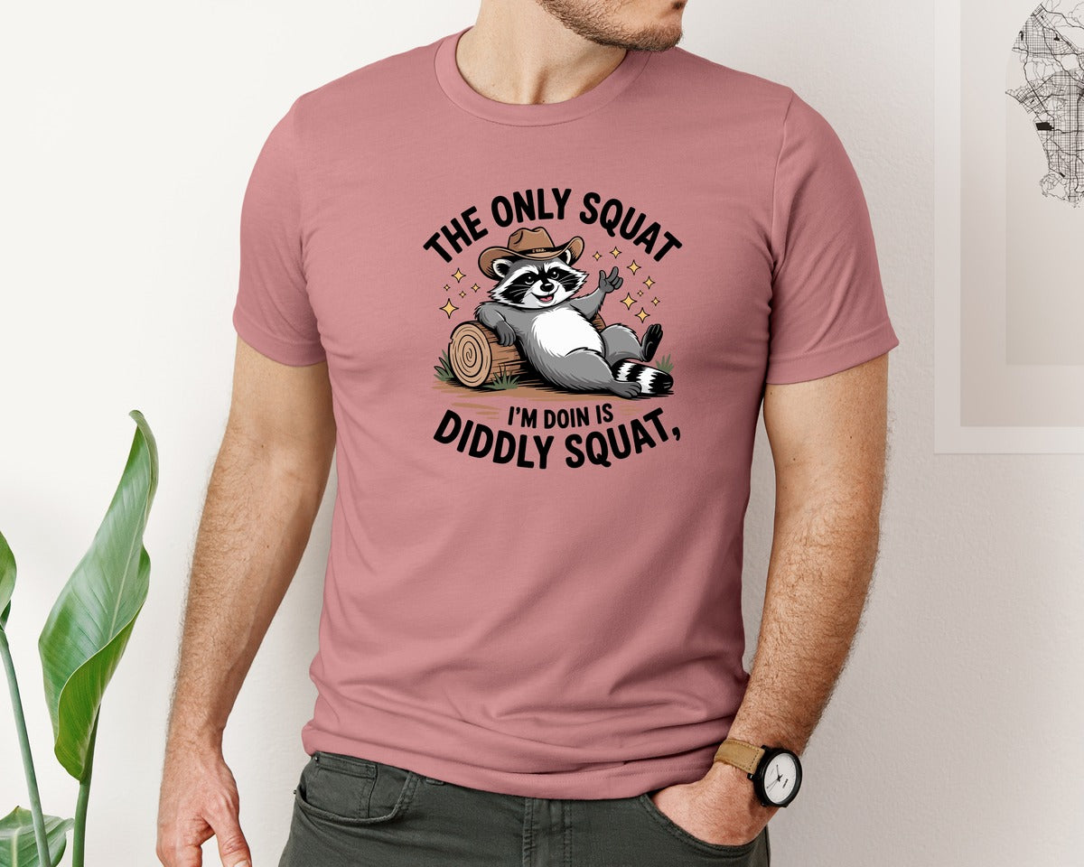 brand:Bella Canvas|color:Heather Mauve|Funny Cowboy Raccoon Graphic T-Shirt