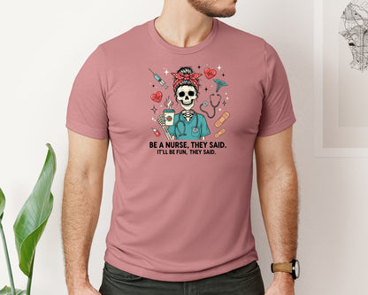 brand:Bella Canvas|color:Heather Mauve|Skeleton Nurse Funny Nurse Graphic T-Shirt