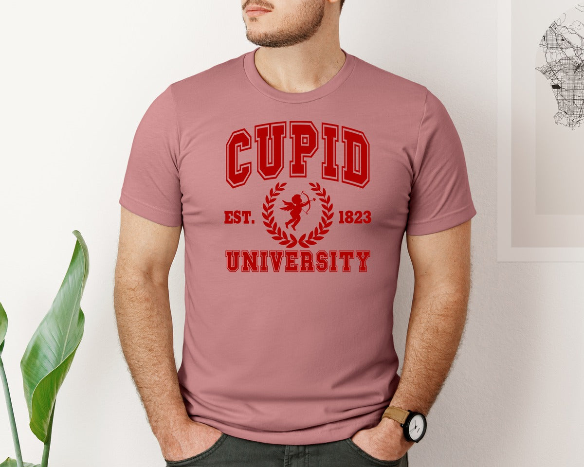 brand:Bella Canvas|color:Heather Mauve|Cupid University Valentines Day Graphic T-Shirt