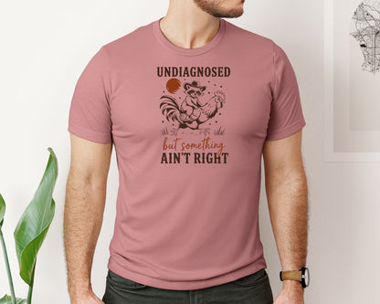 brand:Bella Canvas|color:Heather Mauve|Undiagnosed But Something Aint Right 13 Graphic T-Shirt