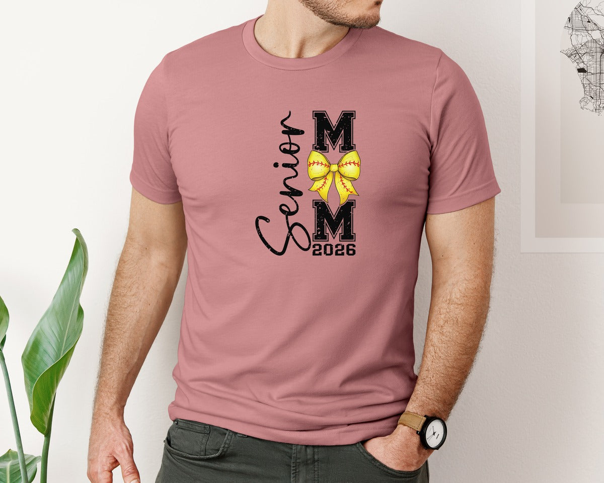 brand:Bella Canvas|color:Heather Mauve|2026 Senior Softball Mom Coquette Bow Graphic T-Shirt
