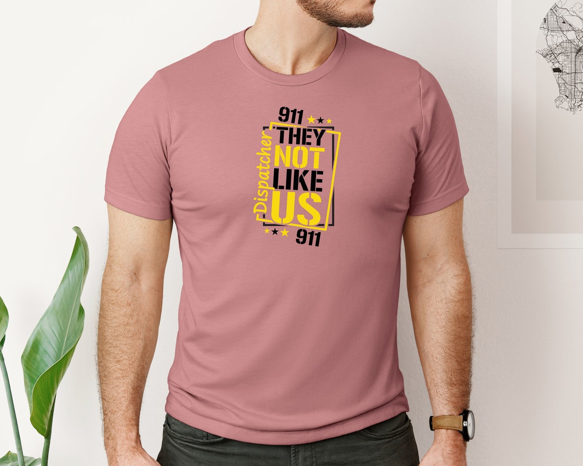 brand:Bella Canvas|color:Heather Mauve|They Not Like Us 911 Dispatcher Graphic T-Shirt