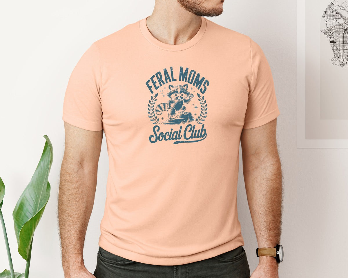 brand:Bella Canvas|color:Heather Peach|Funny Mothers Day Raccoon Mama Feral Mom Graphic T-Shirt
