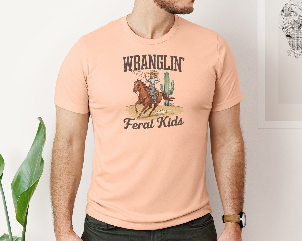 brand:Bella Canvas|color:Heather Peach|Wranglin Feral Kids Western Mothers Day 3 Graphic T-Shirt