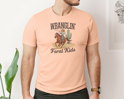 brand:Bella Canvas|color:Heather Peach|Wranglin Feral Kids Western Mothers Day 3 Graphic T-Shirt
