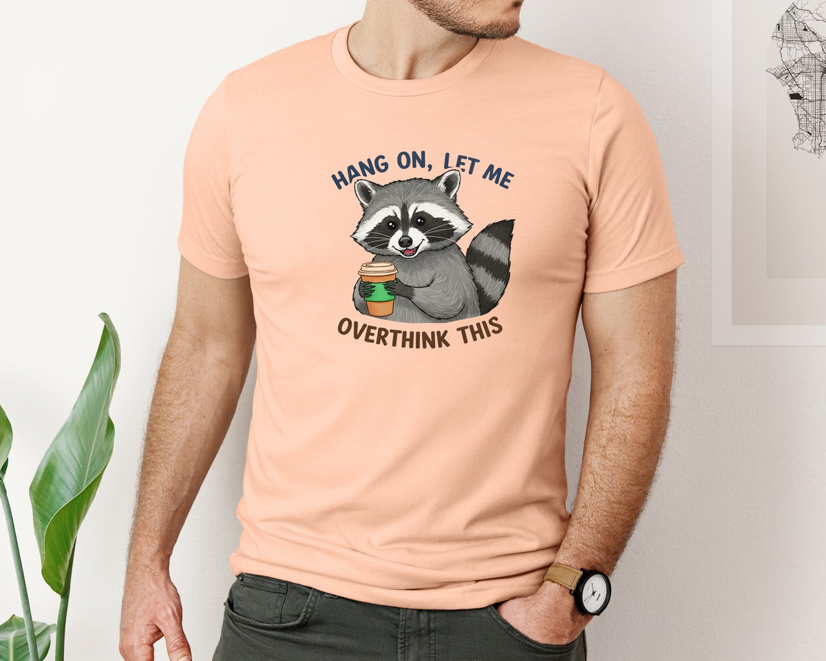 brand:Bella Canvas|color:Heather Peach|Hang On Let Me Overthink This Raccoon 3 Graphic T-Shirt