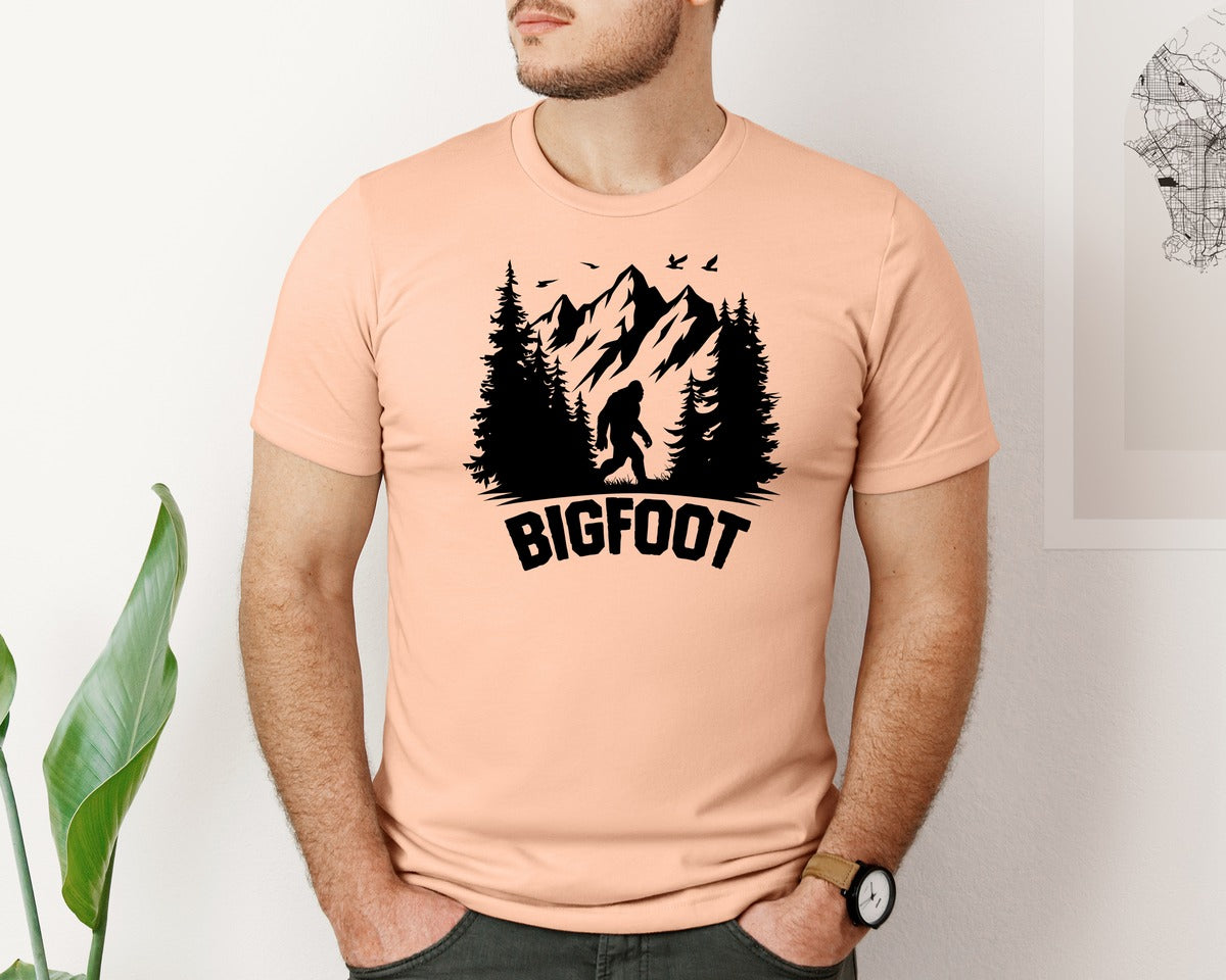 brand:Bella Canvas|color:Heather Peach|Retro Bigfoot Silhouette Pixel Art Graphic T-Shirt