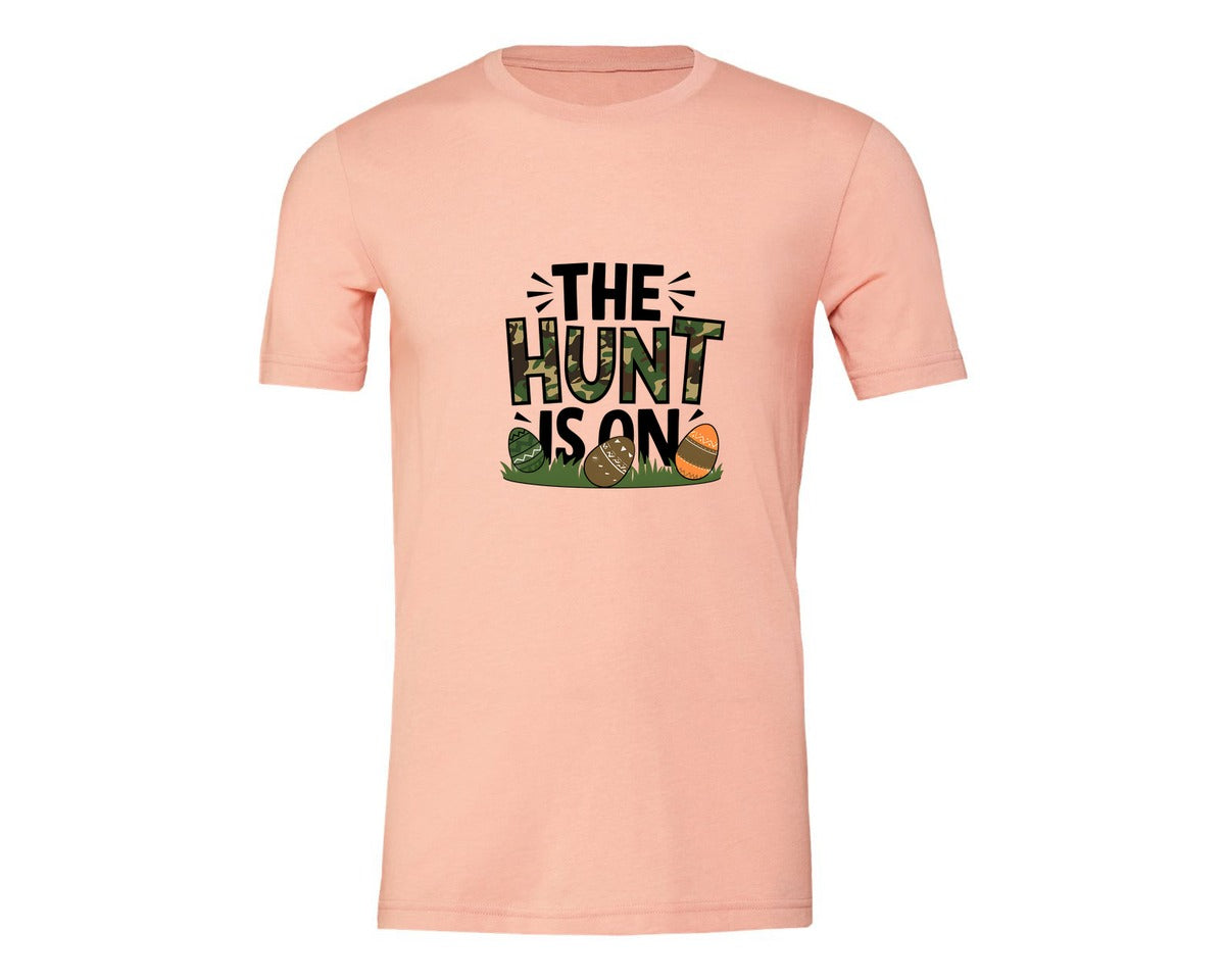 brand:Generic|color:Heather Peach|The Hunt Is On Camo Easter Egg Camo Graphic T-Shirt
