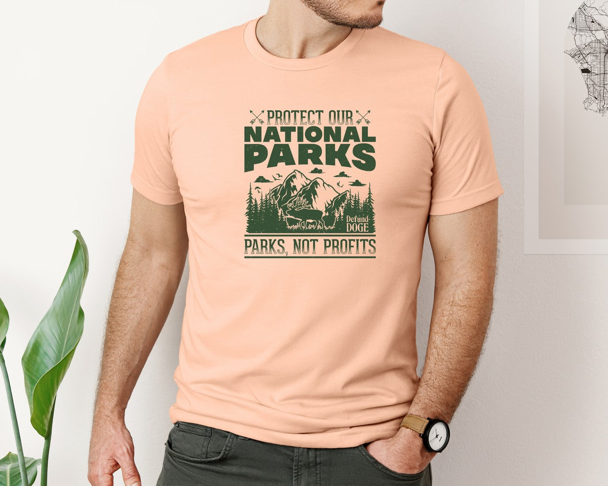 brand:Bella Canvas|color:Heather Peach|Protect Our National Parks Defund Doge 2 Graphic T-Shirt
