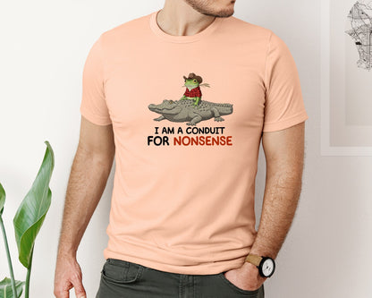 brand:Bella Canvas|color:Heather Peach|I Am A Conduit For Nonsense Frog And All Graphic T-Shirt