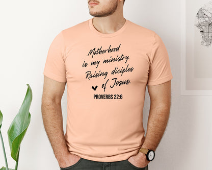 brand:Bella Canvas|color:Heather Peach|Christian Mom Motherhood Is Kingdom Graphic T-Shirt