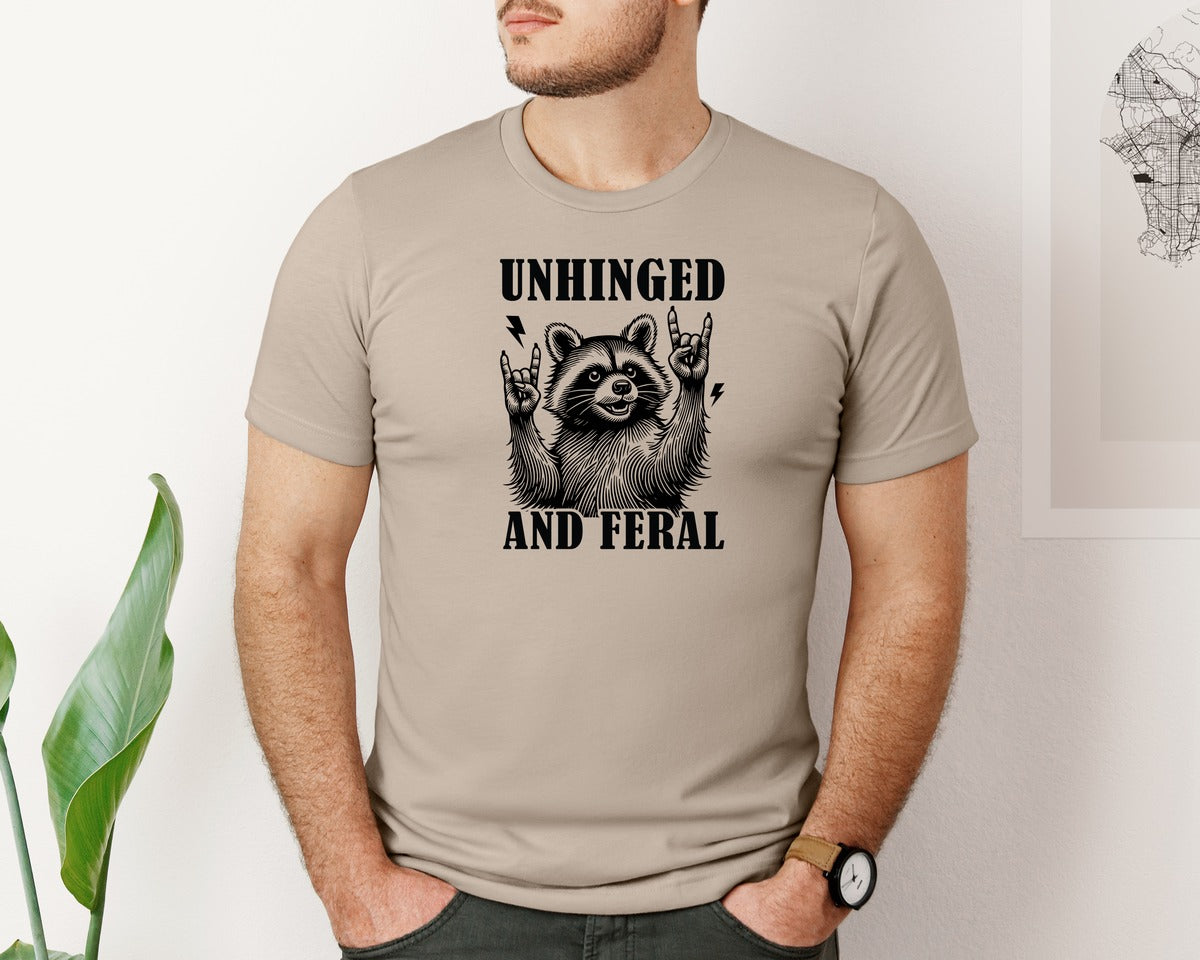 brand:Bella Canvas|color:Heather Tan|Unhinged And Feral Vintage Raccoon Meme Graphic T-Shirt