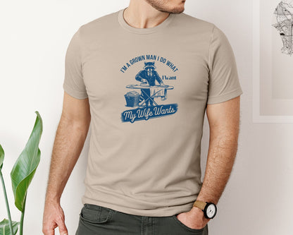 brand:Bella Canvas|color:Heather Tan|Im A Grown Man I Do What I Want My Wife 2 Graphic T-Shirt