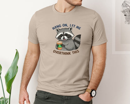 brand:Bella Canvas|color:Heather Tan|Hang On Let Me Overthink This Raccoon 3 Graphic T-Shirt