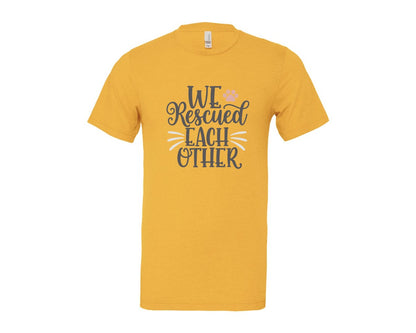 brand:Bella Canvas|color:Heather Yellow Gold|We Rescued Each Other Cute Cat Quote Graphic T-Shirt