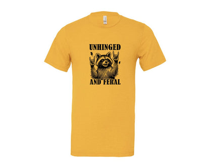 brand:Bella Canvas|color:Heather Yellow Gold|Unhinged And Feral Vintage Raccoon Meme Graphic T-Shirt